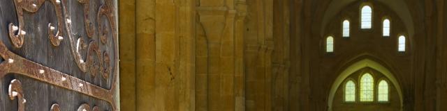 Abbaye De Fontenay Romanesque Cistercian abbey door opening onto the choir