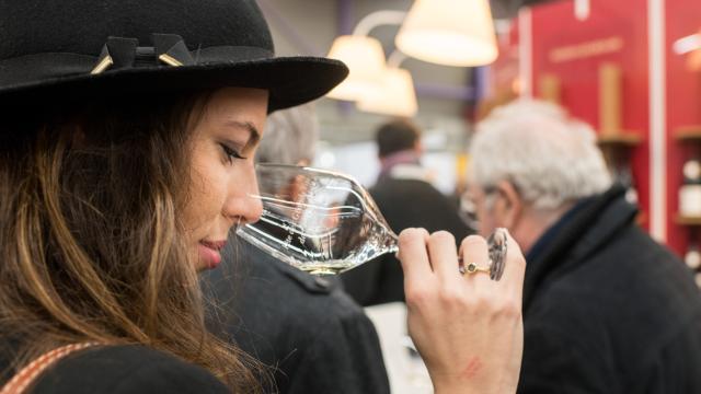 Woman tasting wine glass Burgundy Wine Festival